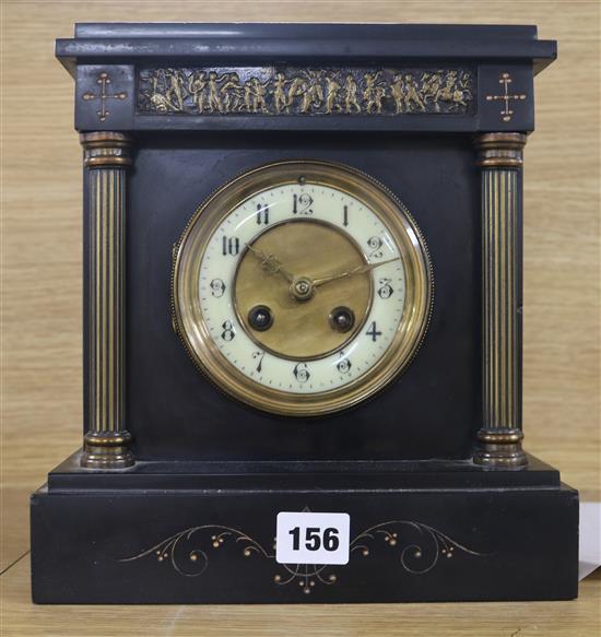 A small black slate clock